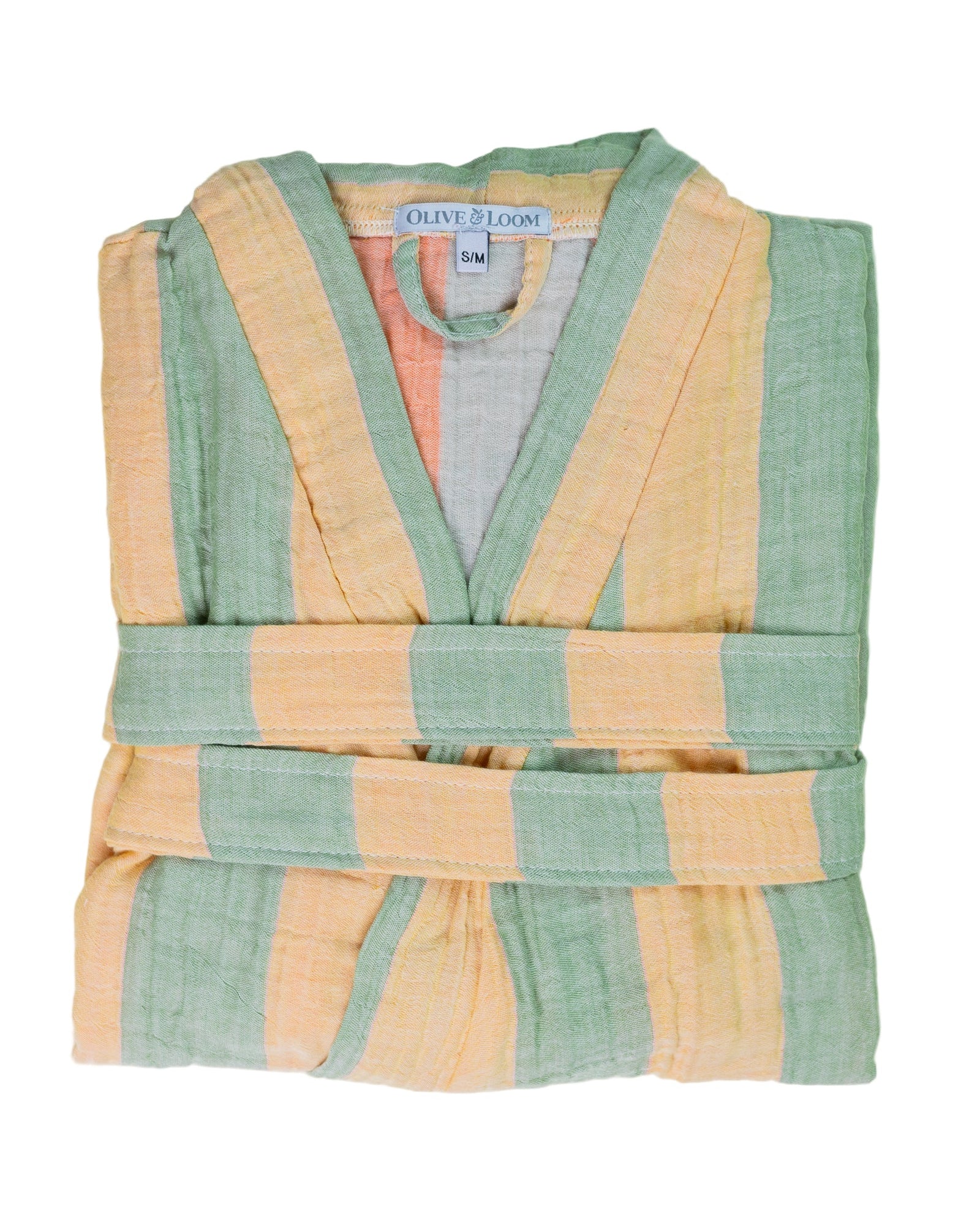 Folded pale yellow and sage green robe with 'Olive & Loom' label on a white background