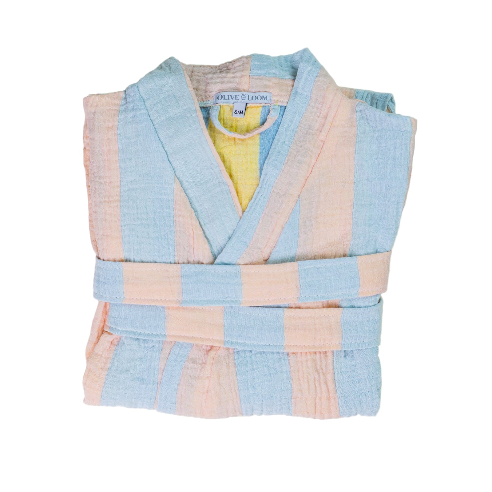 Folded sky blue and light peach robe with 'Olive & Loom' label on a white background