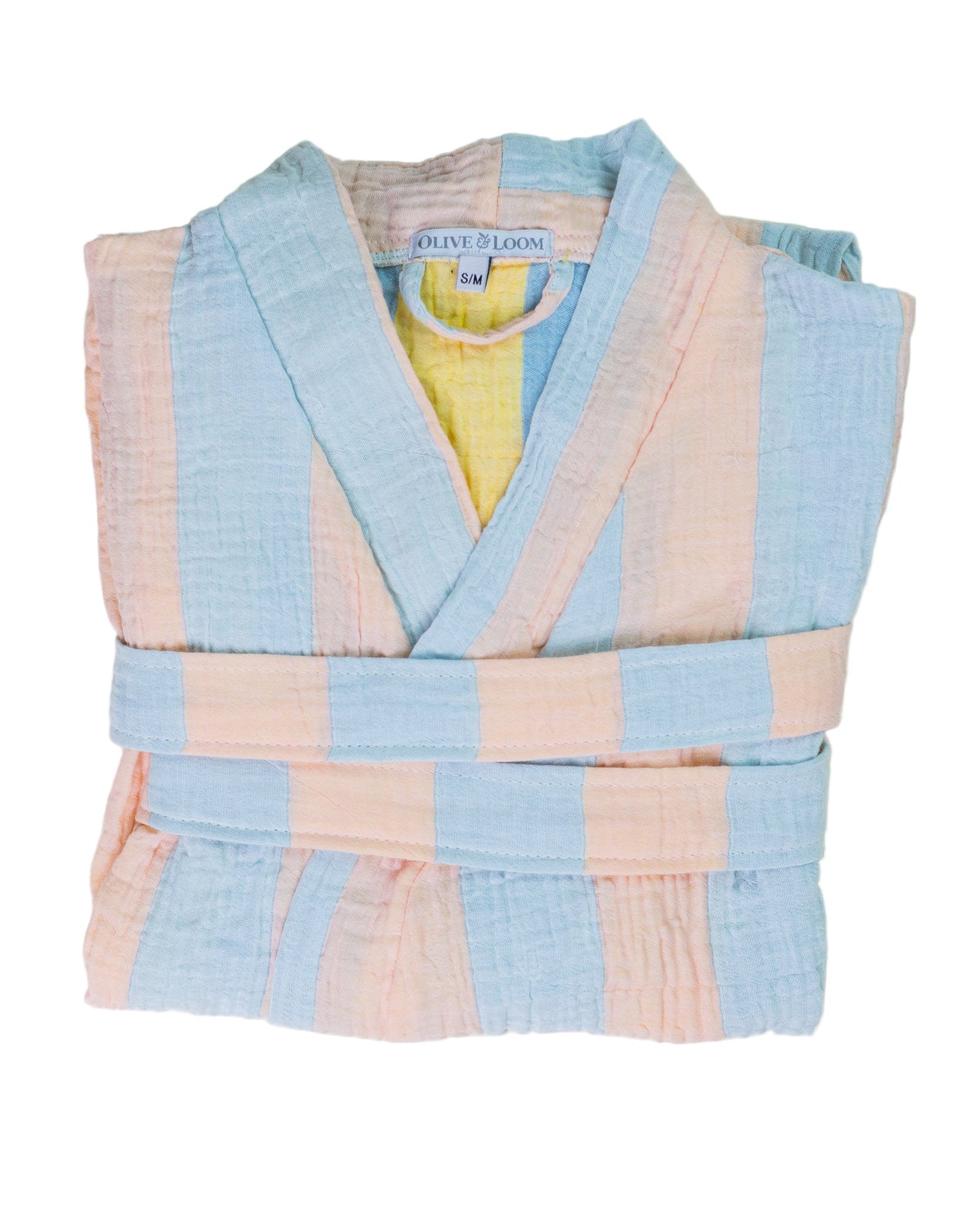 Folded sky blue and light peach robe with 'Olive & Loom' label on a white background
