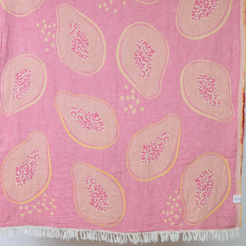 A beach towel with a fruit-inspired jacquard design