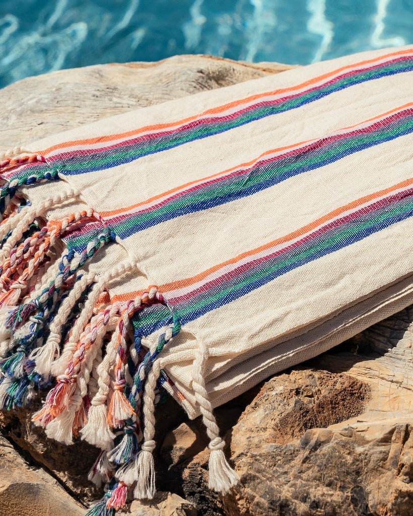 Turkish towel closeup with pool in background