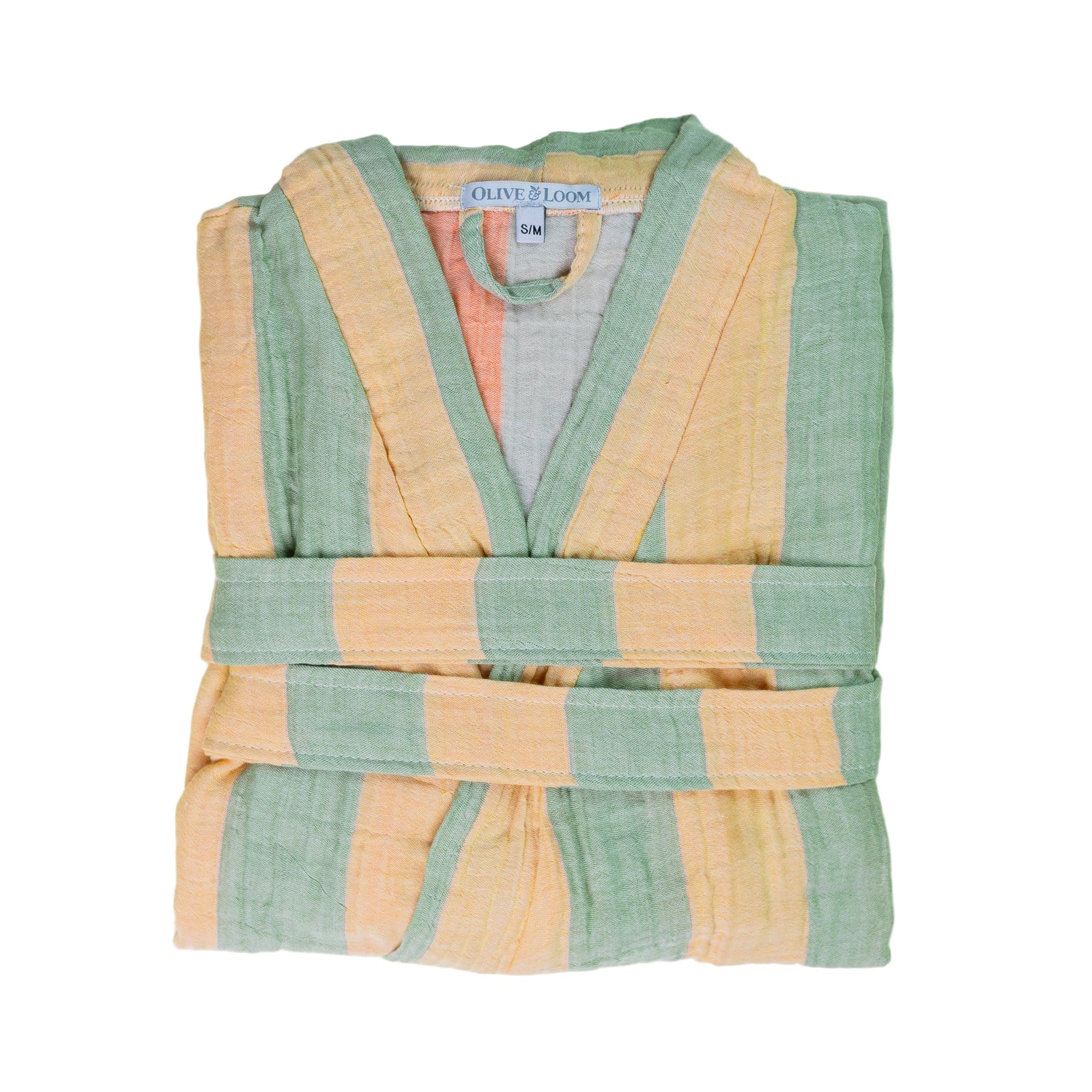 Folded pale yellow and sage green robe with 'Olive & Loom' label on a white background