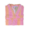 Folded pink and orange peach robe with 'Olive & Loom' label on a white background