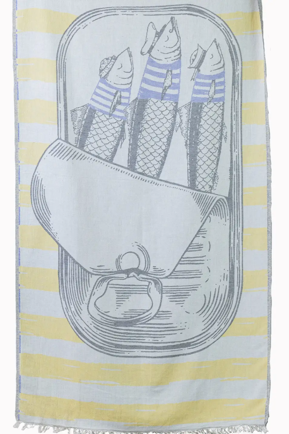 A yellow and white striped Turkish beach towel with a jacquard design featuring a sardine tin.