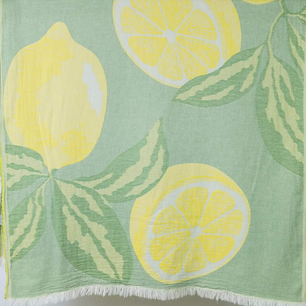 A beach towel with a fruit-inspired jacquard design