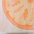 A beach towel with a fruit-inspired jacquard design