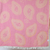 A beach towel with a fruit-inspired jacquard design