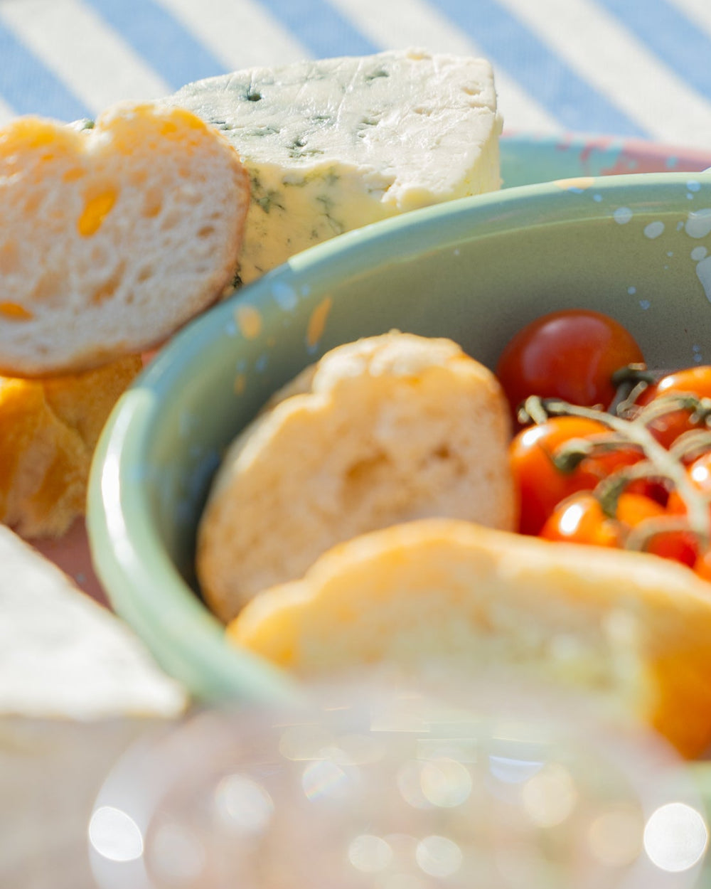 enamel dish on a brightly decorated picnic table