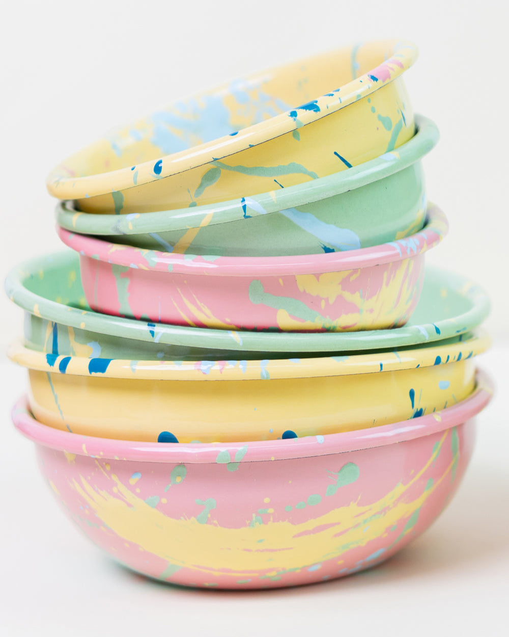 stack of enamel bowls
