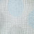 Close-up of textured fabric with blue cross hatch patterns