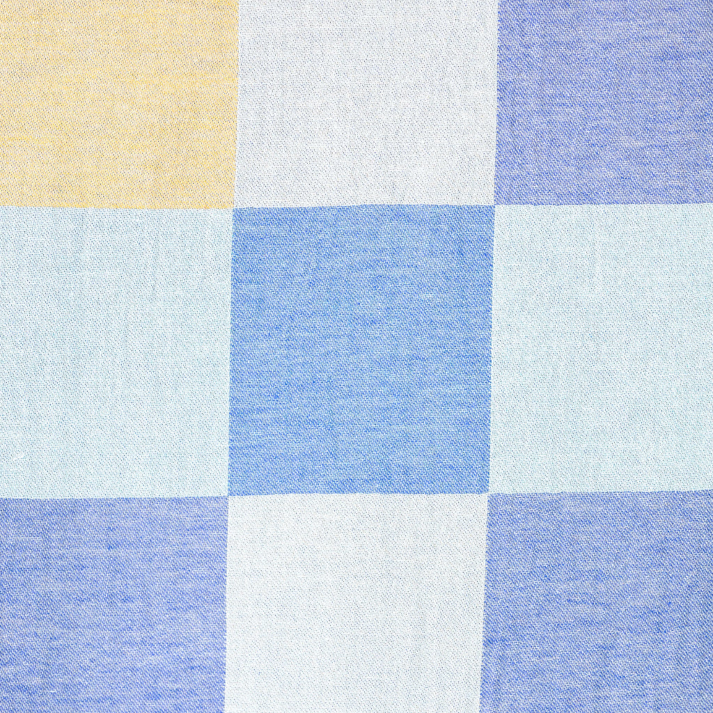 Checkered fabric pattern with blue, white, and yellow squares