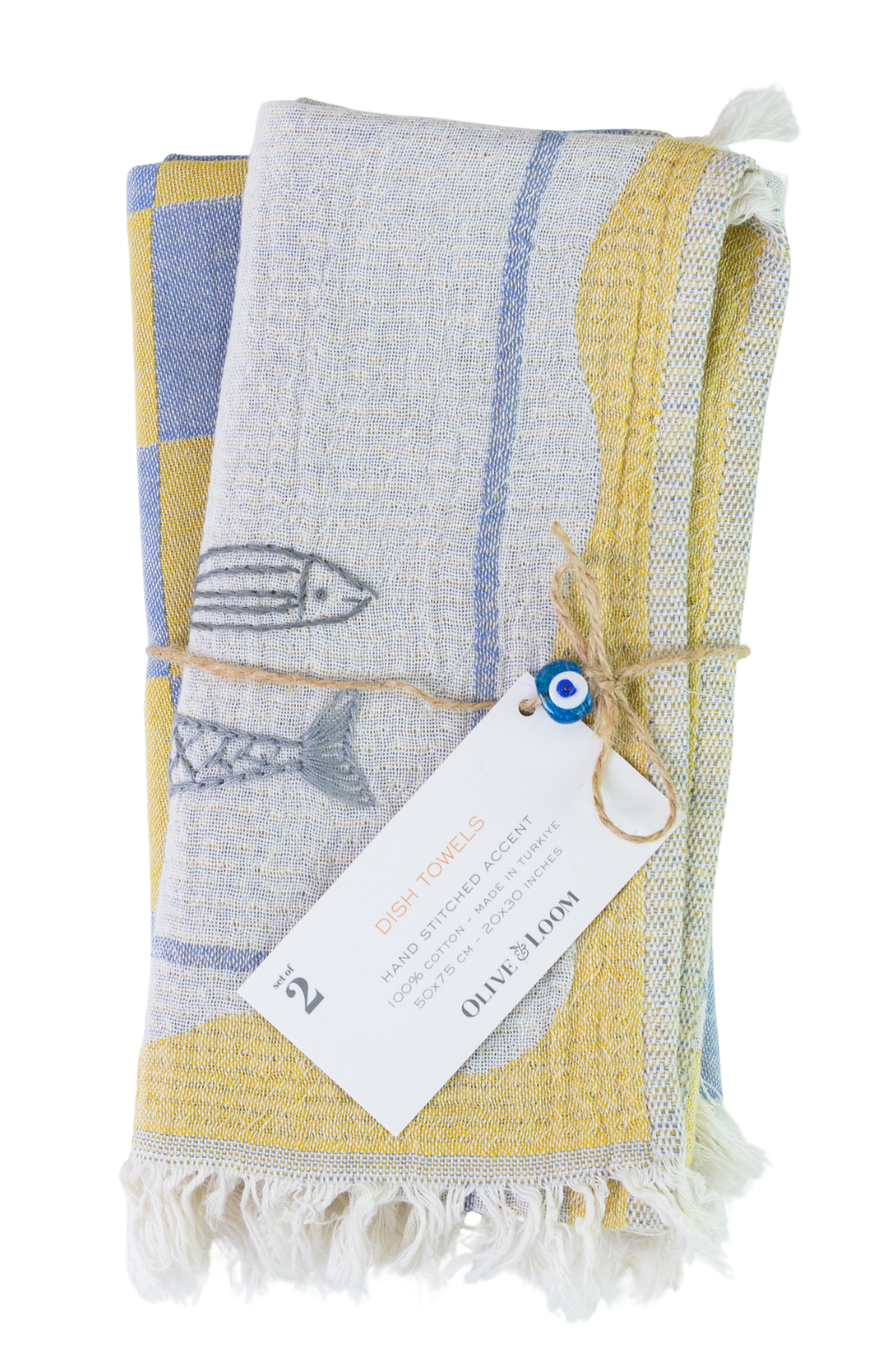 Textured towel with fish design and brand tag on a white background