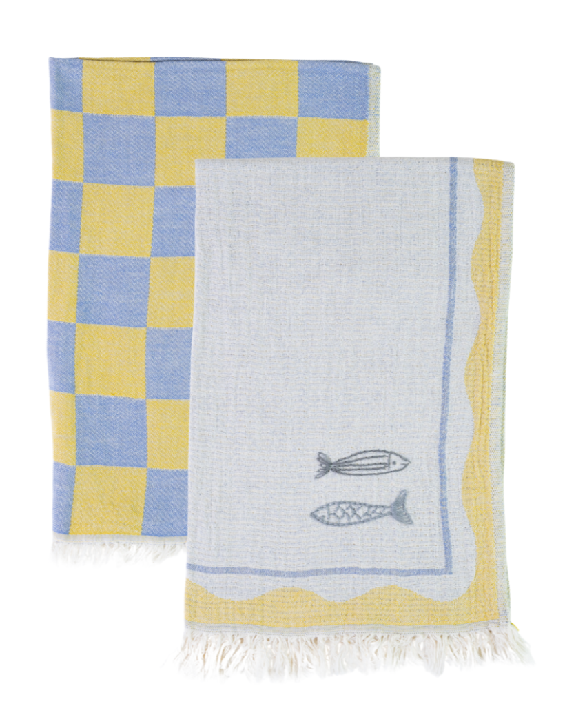 Checkered towel with fish design on a white background