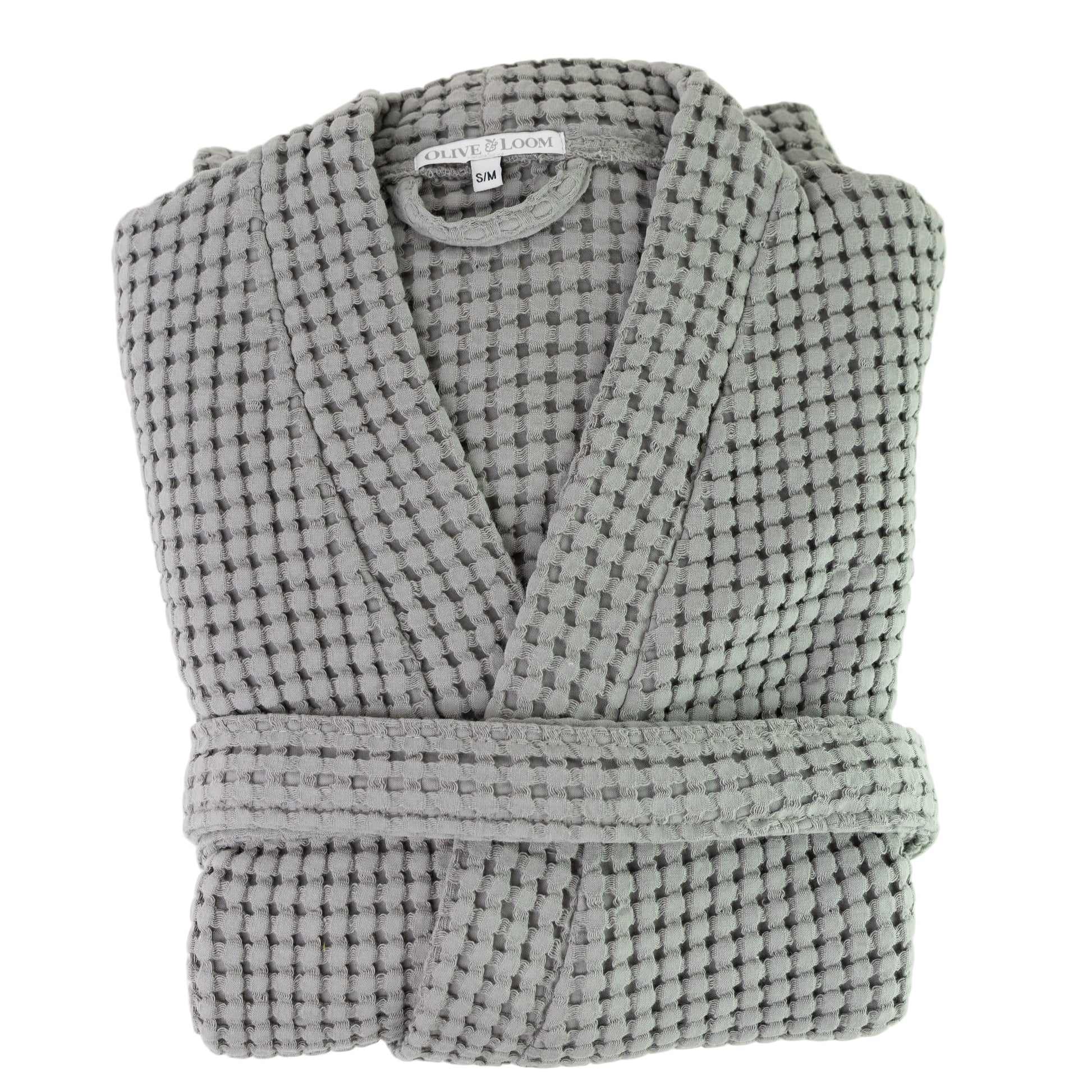 Folded waffle robe in grey against a white background