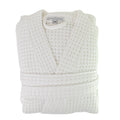 Folded waffle robe in white against a white background