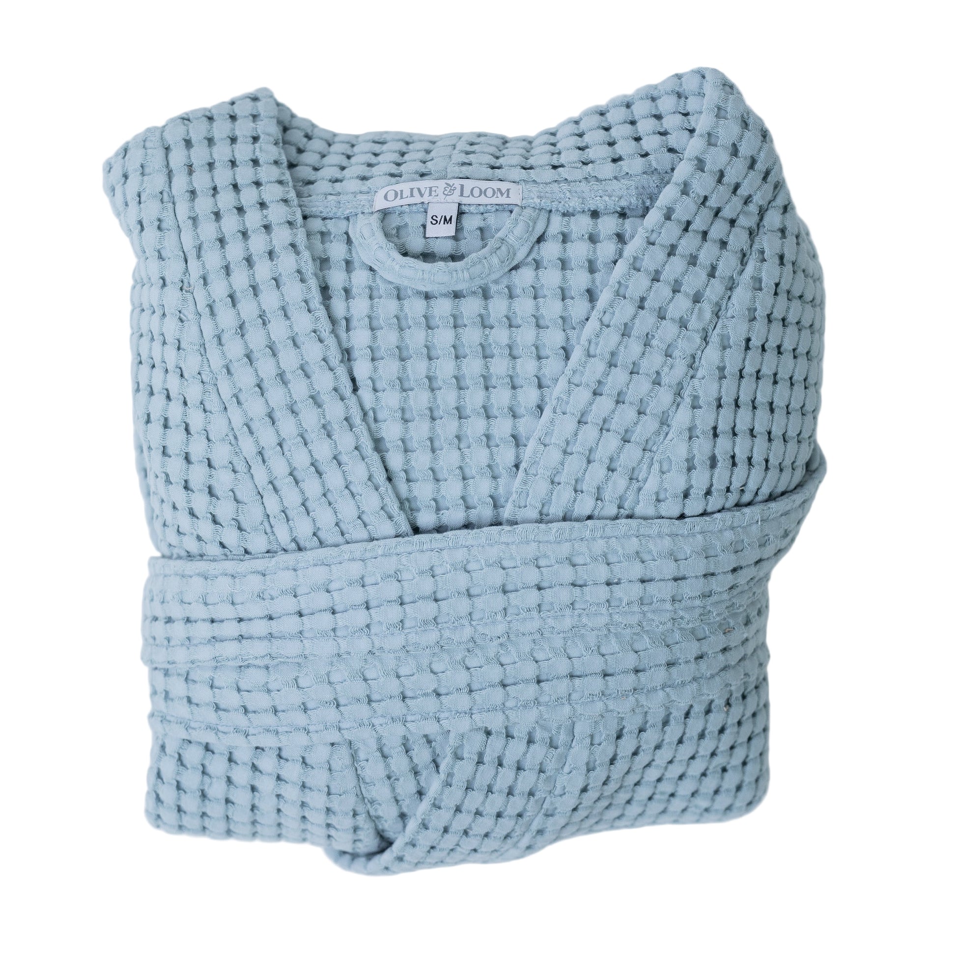 Folded waffle robe in sky blue against a white background