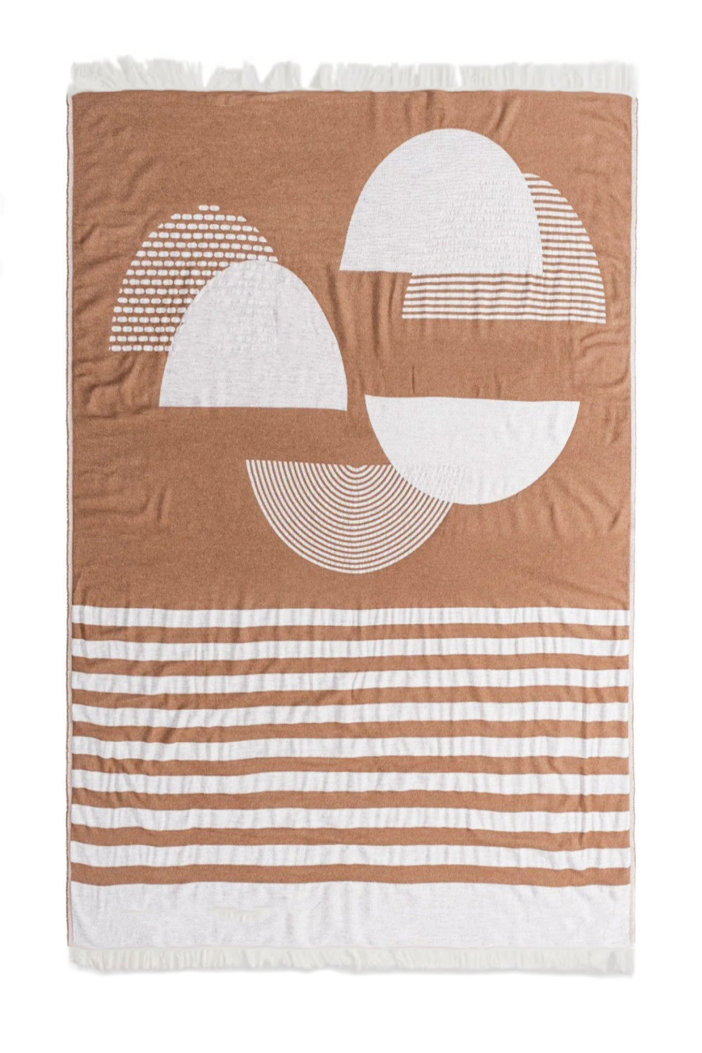 Throw blanket with geometric patterns in brown and white tones, laid flat.