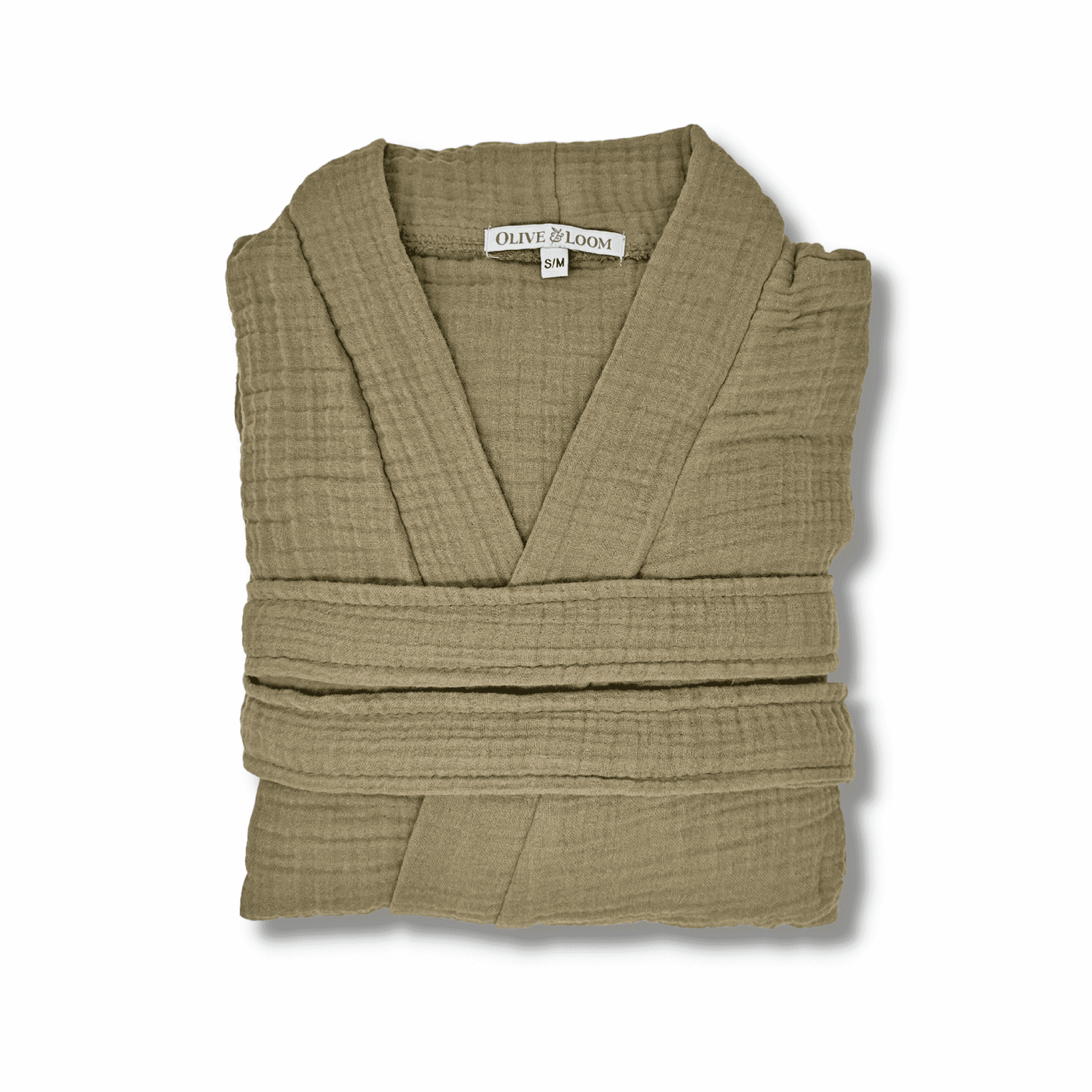 Timber brown colored muslin spa robe folded on a white background